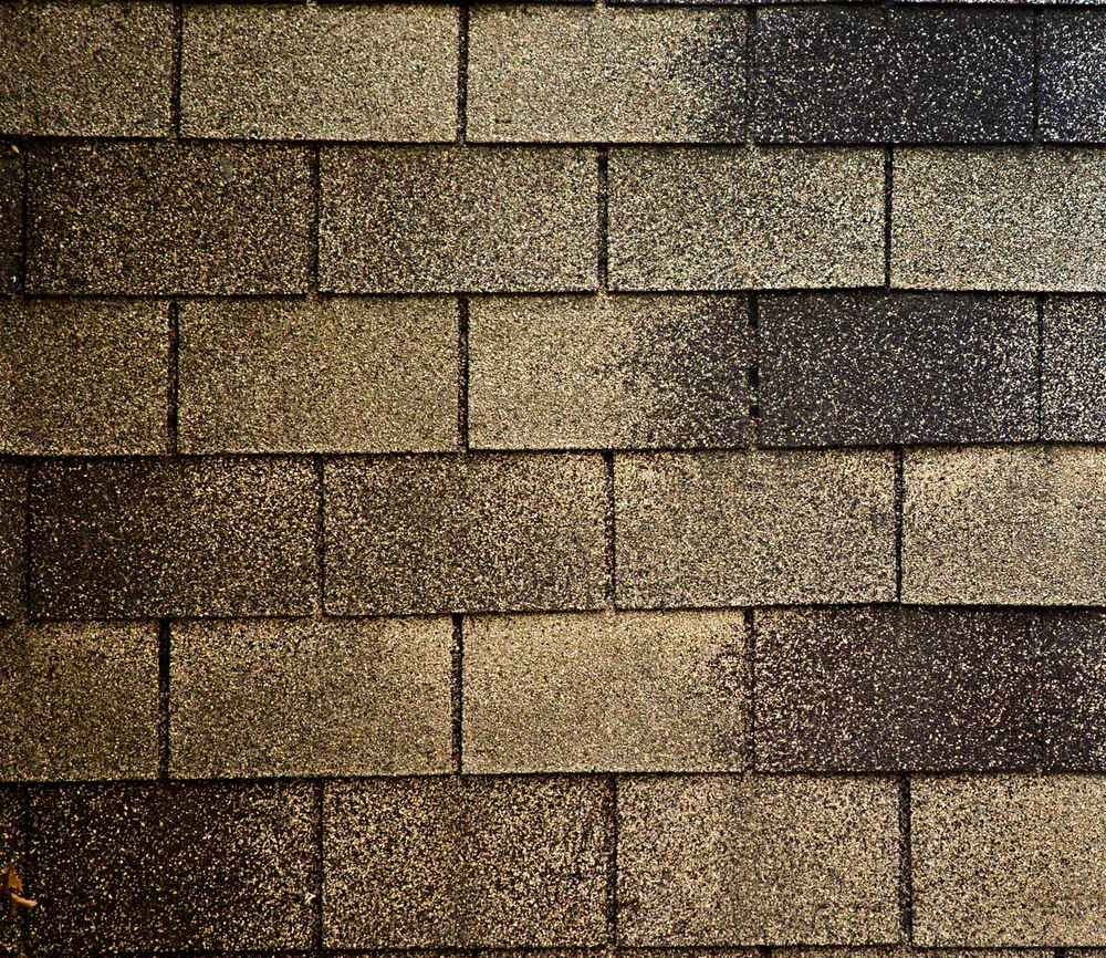 Side-by-side comparison of 3-tab shingles and architectural shingles